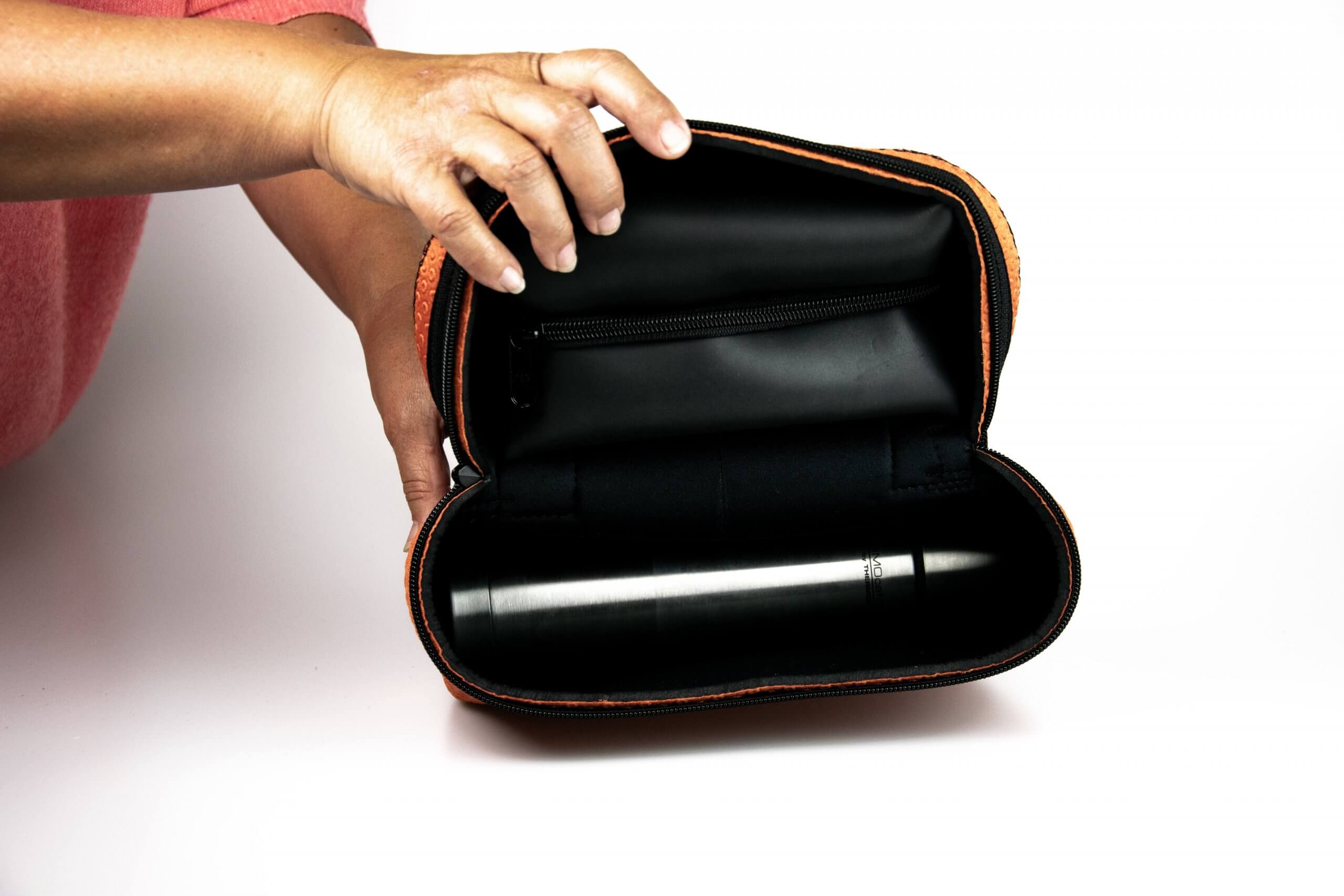 Hugo Orange Dot Bag shown open with smartphone tucked well inside